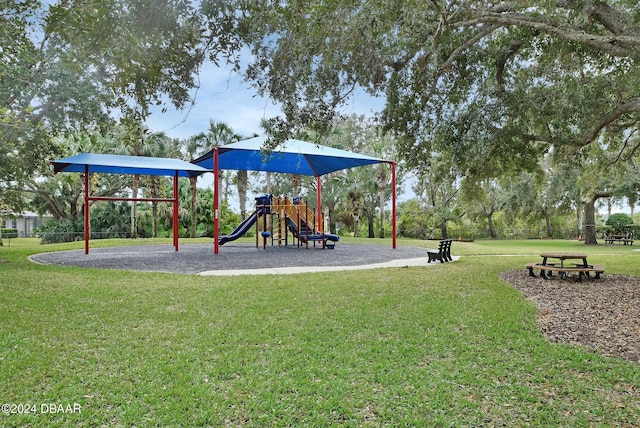 view of playground featuring a lawn