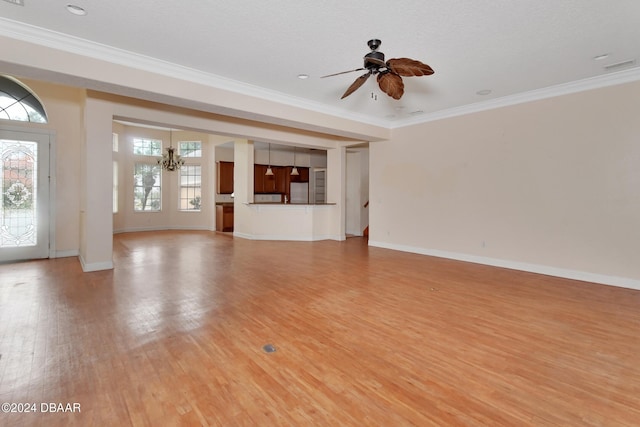 unfurnished living room featuring a textured ceiling, ceiling fan with notable chandelier, light hardwood / wood-style flooring, and ornamental molding