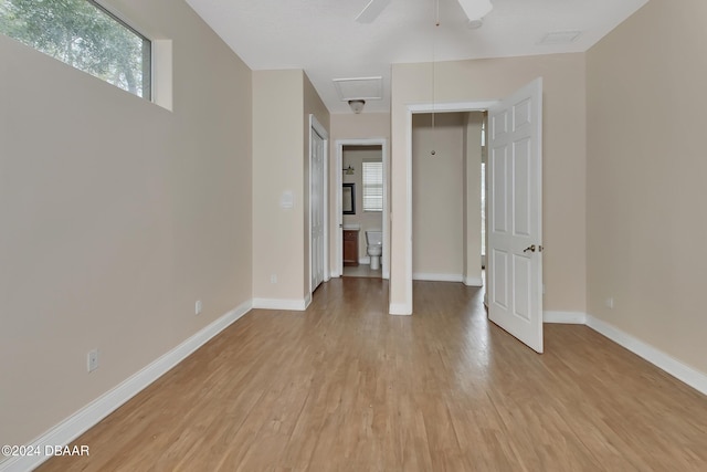 spare room featuring ceiling fan and light wood-type flooring