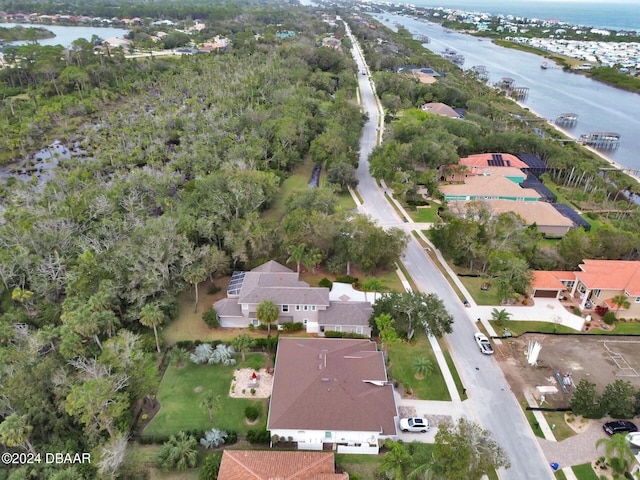 drone / aerial view with a water view