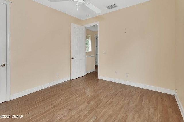 unfurnished room featuring ceiling fan and light hardwood / wood-style flooring