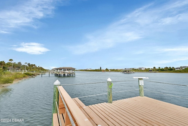 view of dock with a water view