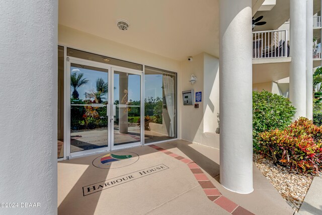 entrance to property with a balcony