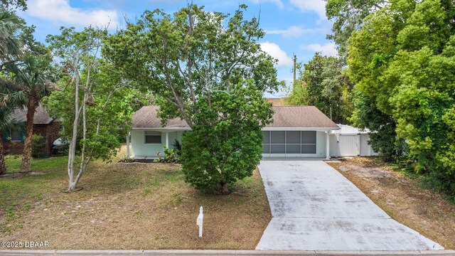 view of front of house featuring driveway and stucco siding