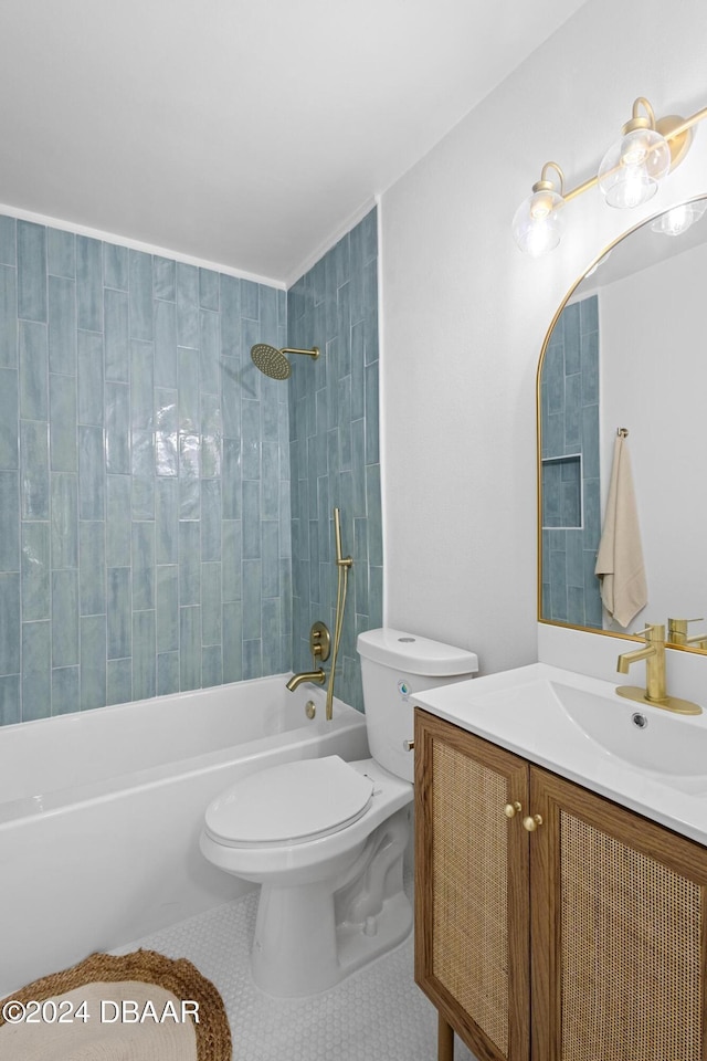 full bathroom featuring tile patterned floors, vanity, toilet, and tub / shower combination