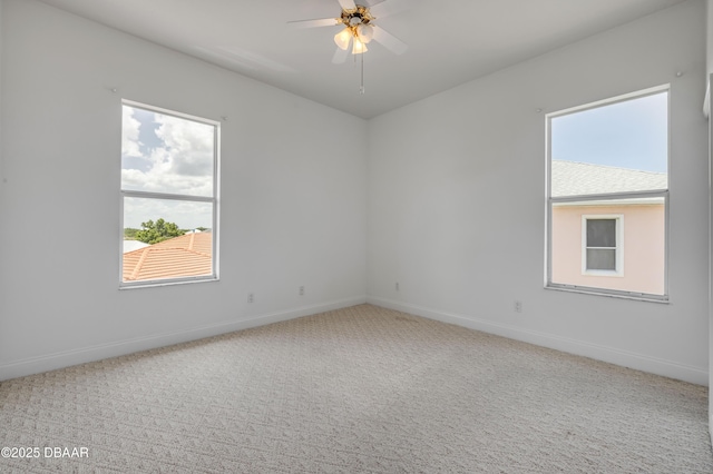 4690 S Atlantic Ave, Ponce Inlet, FL 32127 - unfurnished room with carpet and a ceiling fan