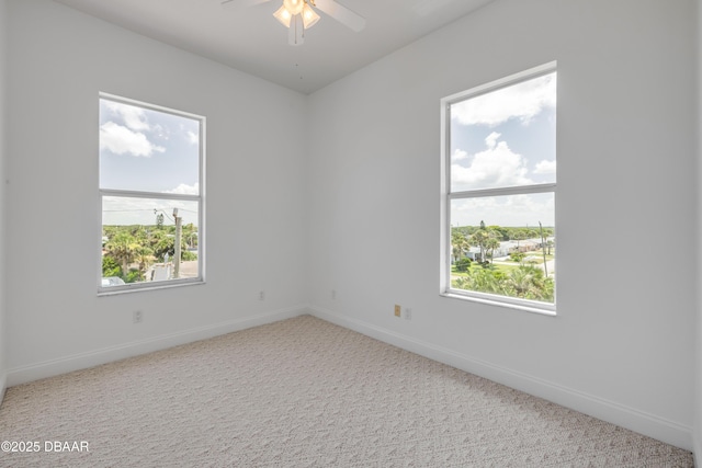 4690 S Atlantic Ave, Ponce Inlet, FL 32127 - empty room with carpet floors and ceiling fan