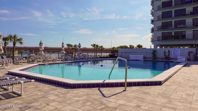 view of pool featuring a patio