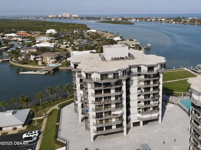 drone / aerial view with a water view