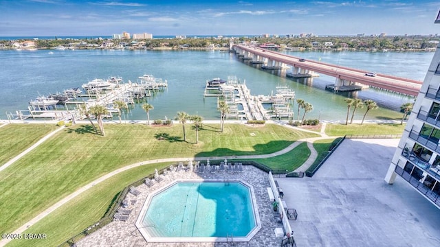 birds eye view of property featuring a water view