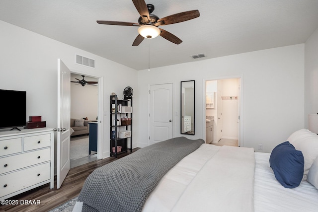 bedroom with wood-type flooring and ceiling fan