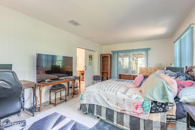 tiled bedroom featuring visible vents