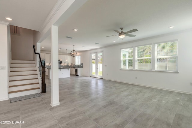 unfurnished living room with a ceiling fan, recessed lighting, and ornamental molding