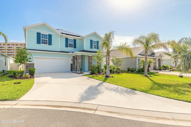 traditional home with a porch, roof mounted solar panels, a front lawn, concrete driveway, and an attached garage
