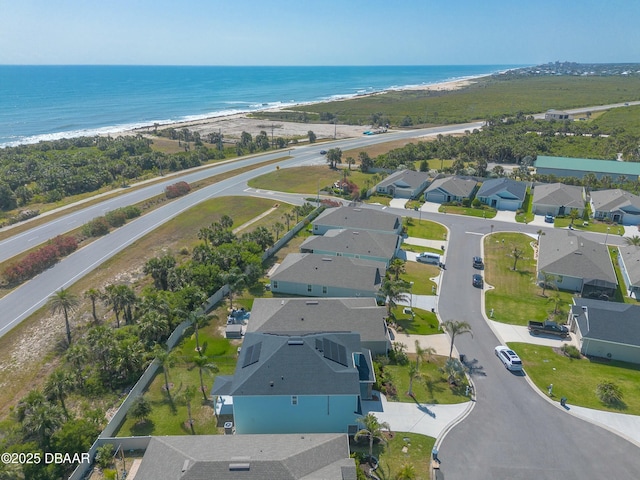 bird's eye view with a residential view and a water view