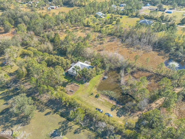 bird's eye view with a rural view and a water view