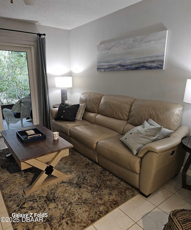 dining space featuring ceiling fan, lofted ceiling, and a textured ceiling