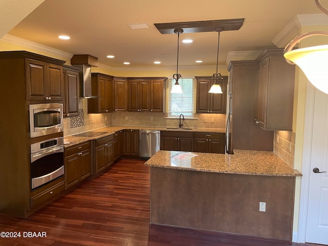 kitchen featuring stainless steel appliances, dark wood-type flooring, a sink, light stone countertops, and wall chimney exhaust hood