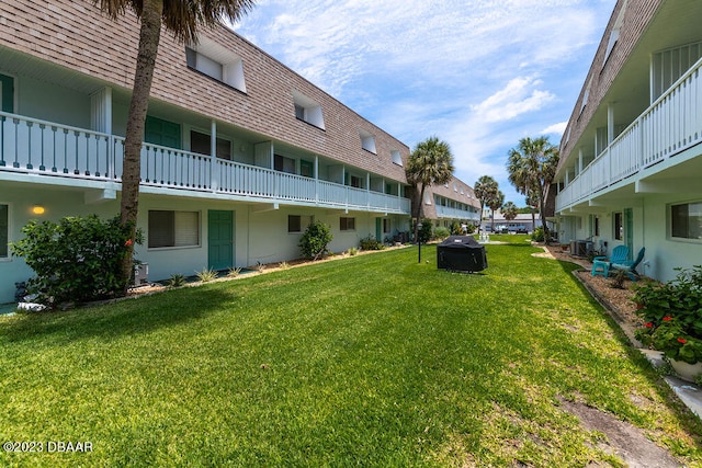 exterior space featuring a balcony and central AC