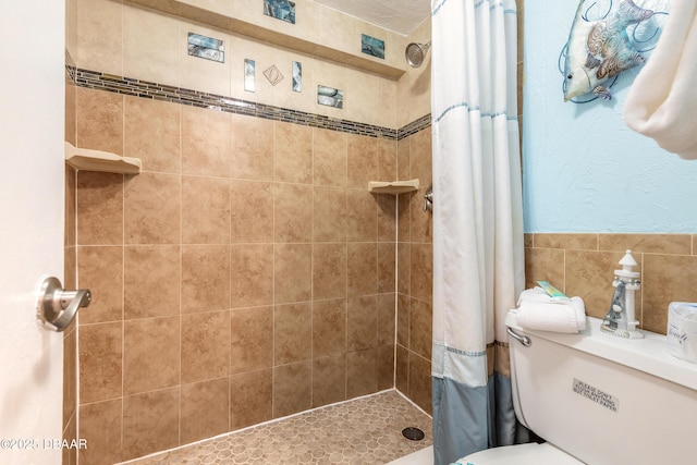 313 S Atlantic Avenue 302 & 304, Daytona Beach, FL 32118 - bathroom featuring tiled shower and tile walls