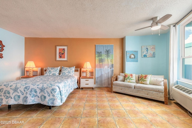 313 S Atlantic Avenue 302 & 304, Daytona Beach, FL 32118 - bedroom featuring tile patterned floors, a textured ceiling, and ceiling fan