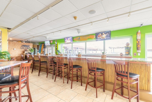 313 S Atlantic Avenue 302 & 304, Daytona Beach, FL 32118 - indoor dry bar featuring track lighting and tile patterned flooring