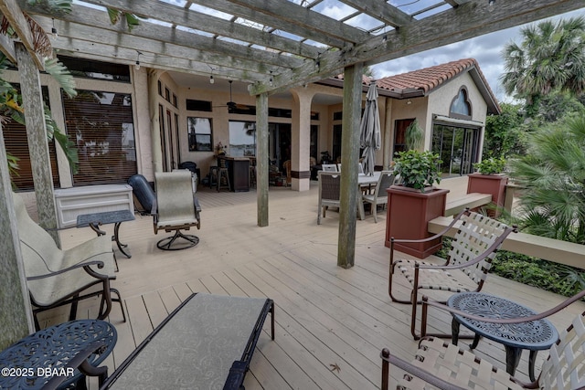 6 Rosalyn Lndg, Daytona Beach, FL 32118 - wooden terrace featuring outdoor dining area, a pergola, and a ceiling fan