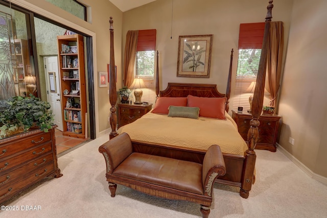 6 Rosalyn Lndg, Daytona Beach, FL 32118 - carpeted bedroom featuring baseboards and vaulted ceiling