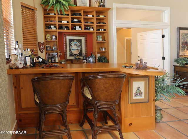 6 Rosalyn Lndg, Daytona Beach, FL 32118 - indoor dry bar with tile patterned floors