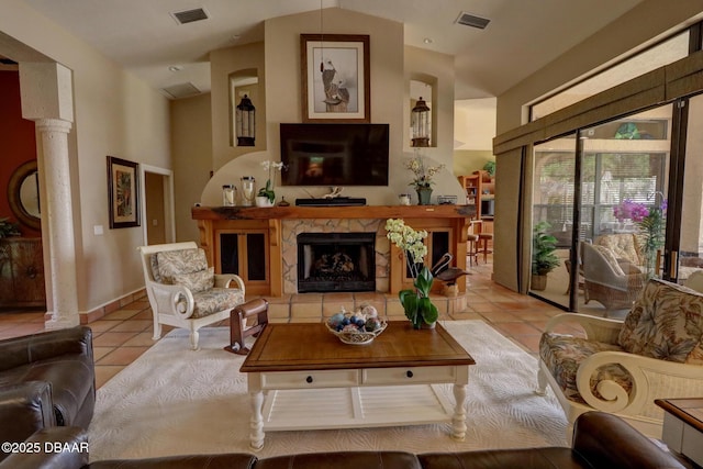 6 Rosalyn Lndg, Daytona Beach, FL 32118 - tiled living area with high vaulted ceiling, ornate columns, and a fireplace