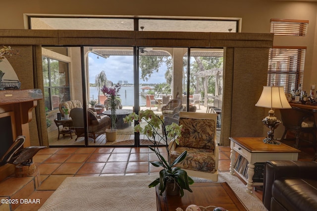 6 Rosalyn Lndg, Daytona Beach, FL 32118 - living room with light tile patterned flooring and plenty of natural light