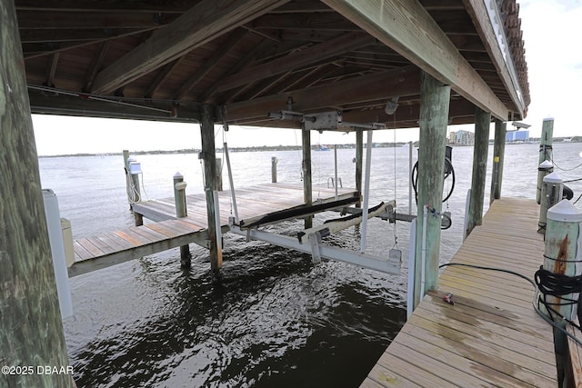 6 Rosalyn Lndg, Daytona Beach, FL 32118 - dock featuring boat lift and a water view