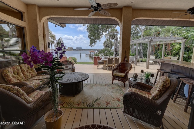 6 Rosalyn Lndg, Daytona Beach, FL 32118 - wooden terrace featuring ceiling fan, an outdoor hangout area, a pergola, a water view, and outdoor dining area