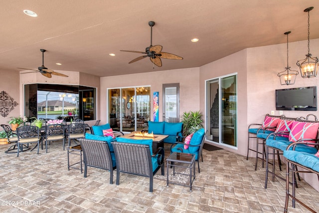 view of patio featuring an outdoor hangout area and ceiling fan