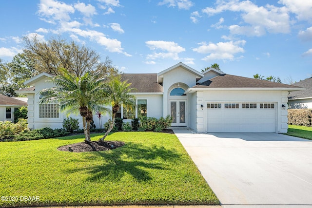 ranch-style house featuring stucco siding, french doors, concrete driveway, and a front yard