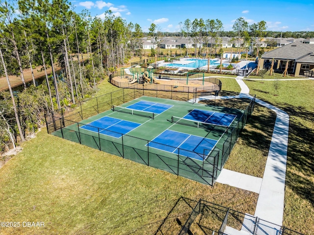 3330 Arch Ave, Ormond Beach, FL 32174 - exterior space featuring fence, a community pool, and a lawn