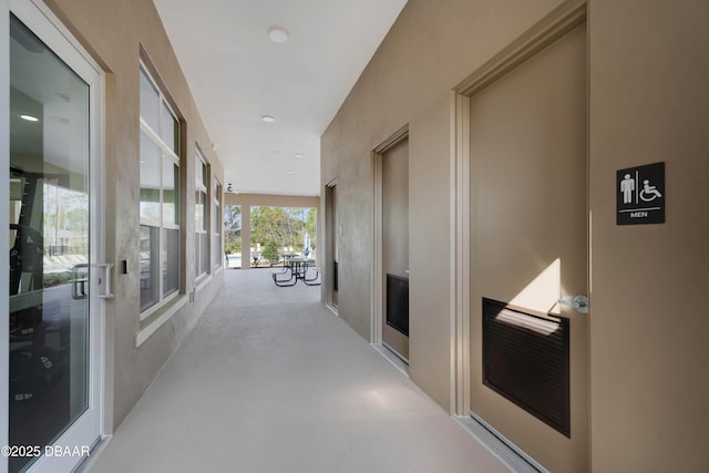 3330 Arch Ave, Ormond Beach, FL 32174 - hallway featuring concrete flooring