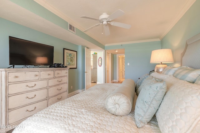 bedroom with ceiling fan, ornamental molding, and ensuite bath