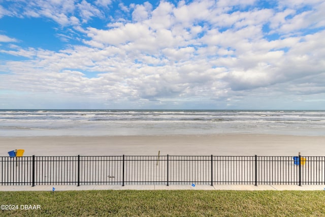 view of water feature with a beach view