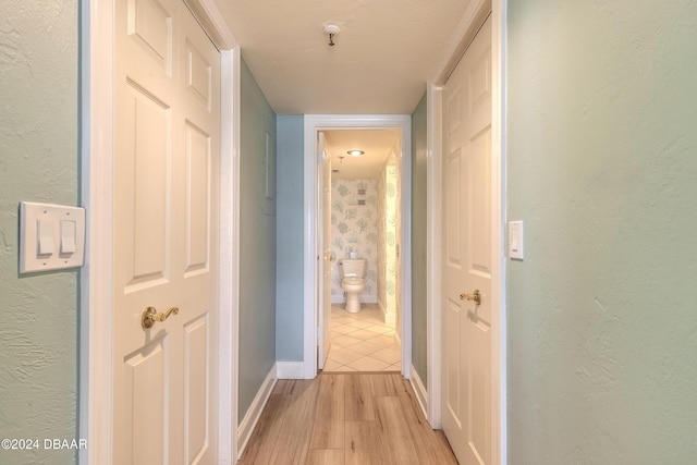 corridor featuring light wood-type flooring