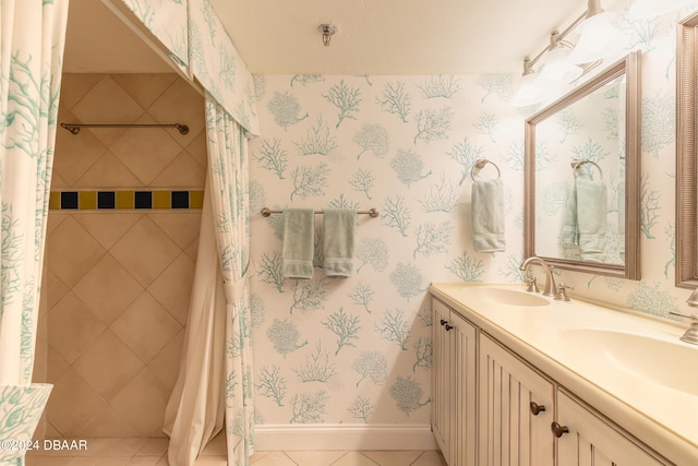 bathroom featuring a shower with curtain, vanity, and tile patterned floors