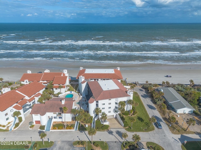 aerial view featuring a water view and a view of the beach