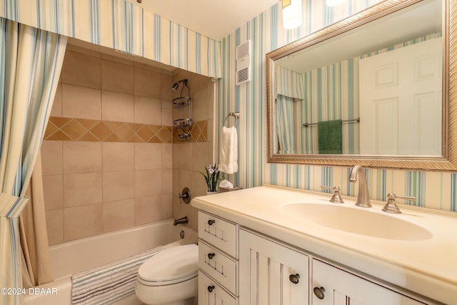 full bathroom with shower / bath combo, vanity, and toilet