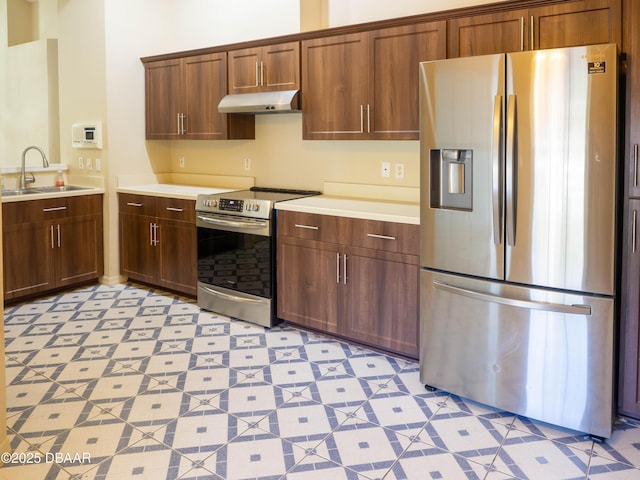 kitchen with appliances with stainless steel finishes and sink