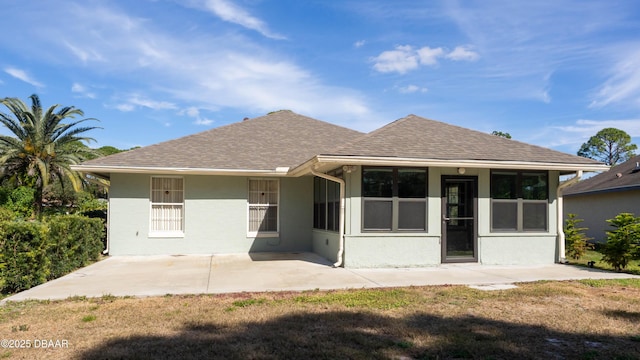 back of property featuring a patio area