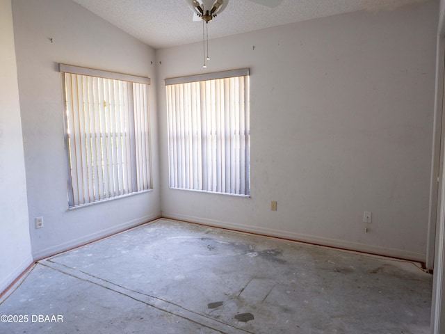 317 Glenbriar Cir, Daytona Beach, FL 32114 - unfurnished room featuring concrete floors, a textured ceiling, and baseboards