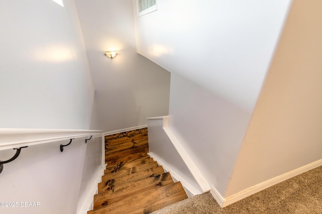 stairway with baseboards