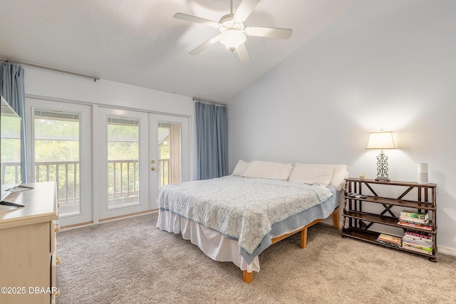 bedroom with access to exterior, vaulted ceiling, light colored carpet, and ceiling fan