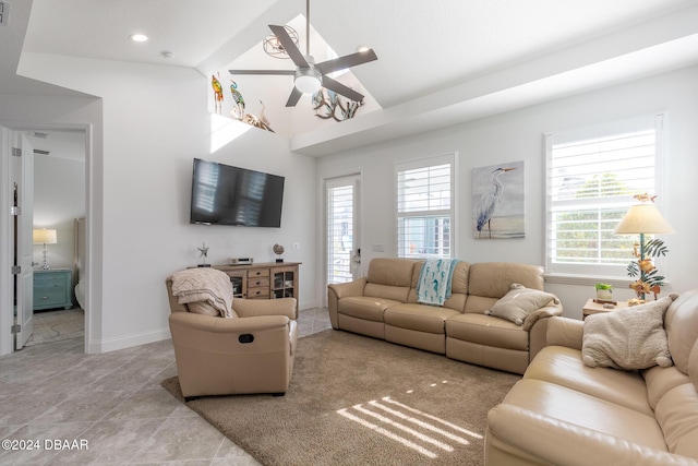 living room with high vaulted ceiling and ceiling fan