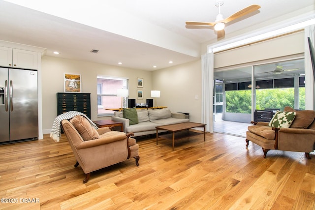 1327 Wayne Ave, New Smyrna Beach, FL 32168 - living room with light wood-style floors, healthy amount of natural light, ceiling fan, and recessed lighting